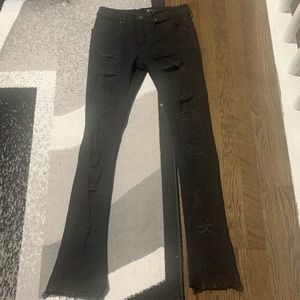 Black rip jeans very skinny stacked